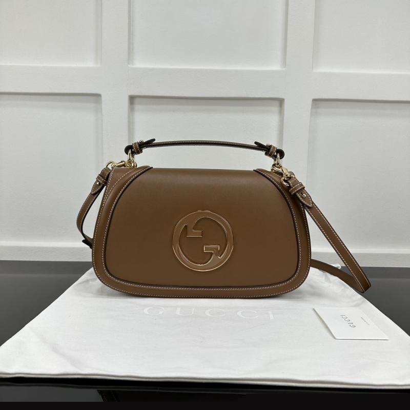 G*u*i top handle bags